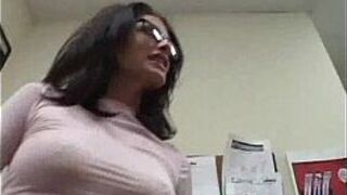 Sexy MILF hottie in glasses taking her clothes off porn video
